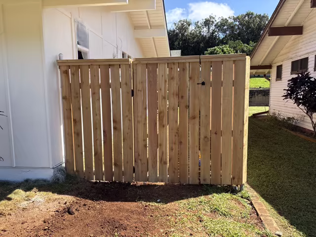 Custom fence installation project on Kauai.