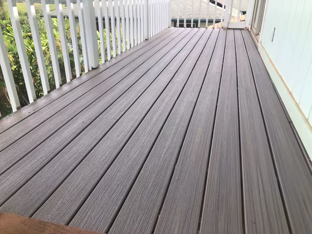 Composite-style deck surface with modern outdoor seating